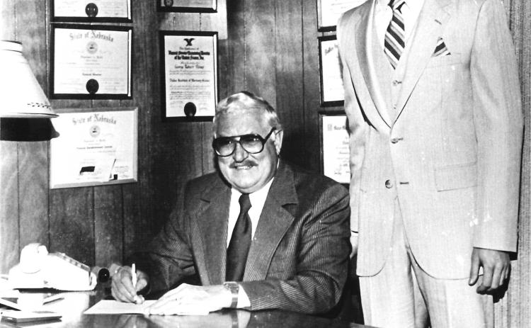 George Palmer (right) began working for his father, Robert, as a funeral director in Fullerton in 1974. This month marks his 50th year serving the Fullerton community. Photo provided