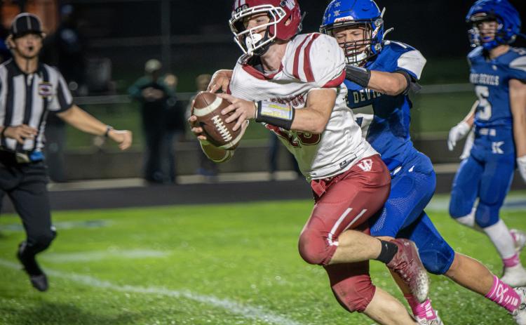 Landen Glup reaches the ball across the goal line to give Fullerton an early lead on Friday at Kenesaw. NCJ photo by Rick Holtz