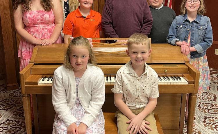 The Kitten on the Keys Music Studio presented a piano/guitar recital on Sunday, April 6 at 7 p.m. in the First National Bank Community Room. Students played solos and duets for family and friends. Pictured are (back row) Mindy, Elena and Jacob Reimer, Brady and Hudson Carr and Paisley Jazwick. (Front row) Charlotte Bittner and Hayes Wetovick. Leta Liesch is the music teacher. Photo provided