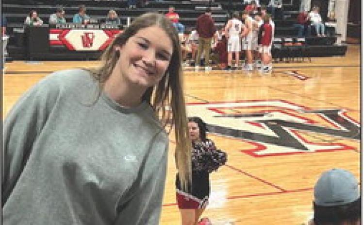 Pictured above is Halle Plumbtree, she is a past Lady Warrior. She currently is a P. E. Teacher in David City.