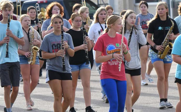 Members of the Fullerton marching band get a little marching practice in earlier this week. The band marched through the streets of Fullerton Monday morning. NCJ photo by Rick Holtz