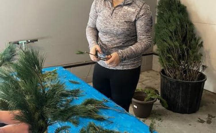 Pictured above: Melinda Pickrel, daughter of Chad &amp; Leslie Pickrel, put her creativity into the greenery arrangements for the residents at Valley View Assisted Living.