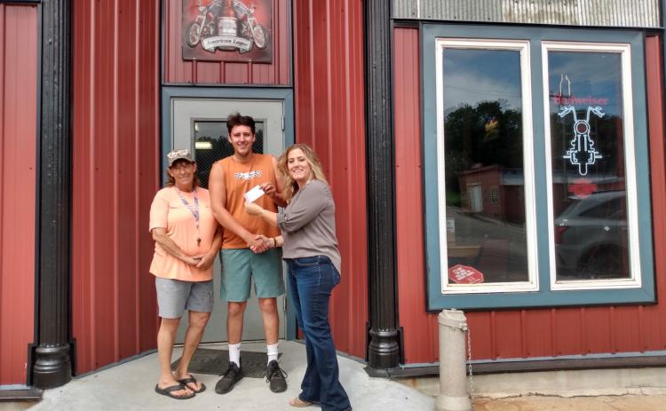The Cedar Valley Community Foundation awarded Belgrade’s newest business, the Corn Krib, a facade grant to help them refurbish the front of the building. Corn Krib owners Cyndie Cornwell and Kyle Cornwell receive the check from Foundation President Christy Yosten. Photos provided