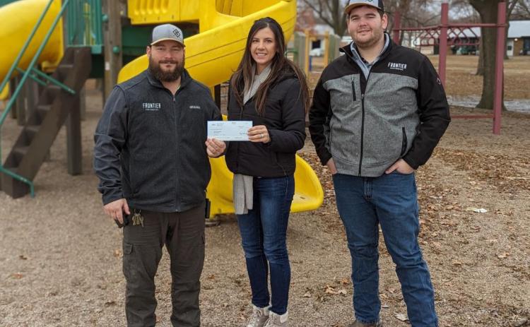 Frontier Cooperative has donated $2,500 toward the city park equipment campaign. Their generous donation will be displayed on the donor wall at completion. Pictured (left to right) Brandon Welch, Brittany Santin (Park Board Member) and Kole Prososki