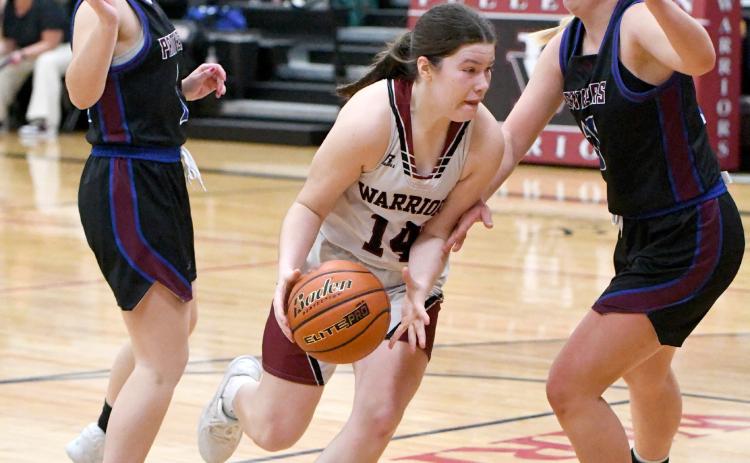 Georgia Bridger makes a move in the paint on her way to 2 of her 7 points on Saturday. NCJ photo by Rick Holtz