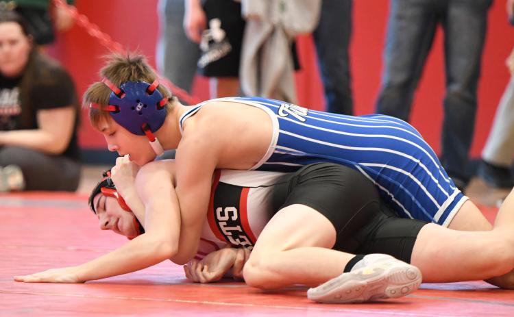 Zach Held works his way to a pin the semifinal match against West Point-Beemer’s Wyatt Miserez. He got the pin in 1:31. NCJ photos by Rick Holtz