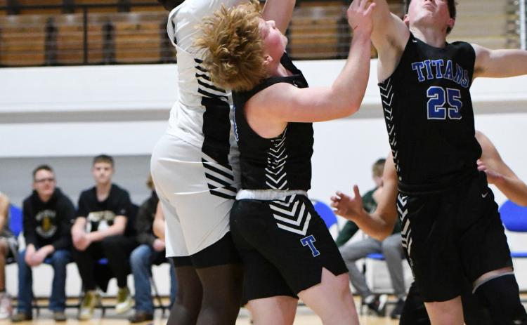 Twin River’s defense had their hands full with McCool Junction’s 6-foot-6, 295 pound Mapieu Kouchinin. NCJ photo by Rick Holtz