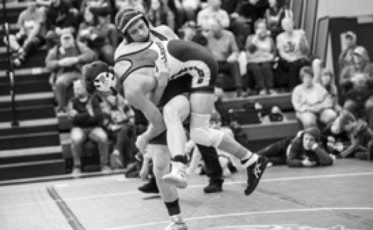 Pictured above: Roe Patton weighing in at 145 lbs fighting off a take down.