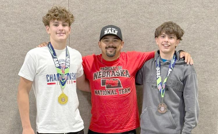 Braxtin Fowler (left) and Cade Kunkel were joined by Twin River coach Kalin Koch at the 2026 AAU Scholastic Duals in Fort Lauderdale, Fla. Photo provided