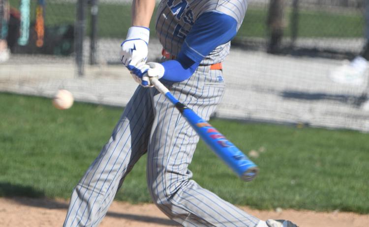 Braxtin Fowler hits a ground ball in the sixth inning. He reached base on an error and later scored in the inning. NCJ photos by Rick Holtz