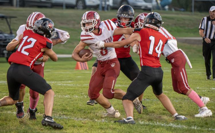 Cael Dubas carried the ball 21 times on his way to 270 yards and four touchdowns. NCJ photo by Rick Holtz