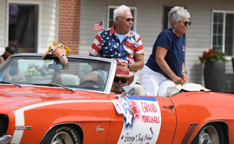 Fullerton residents lined Broadway on Friday for the parade to celebrate the Fourth of July. People on floats threw candy and other items, waved at the crowd as they passed by. The majority of the crowd wore red, white and blue and other summer related outfits. The parade capped the day of festivities. NCJ photos by Rick Holtz