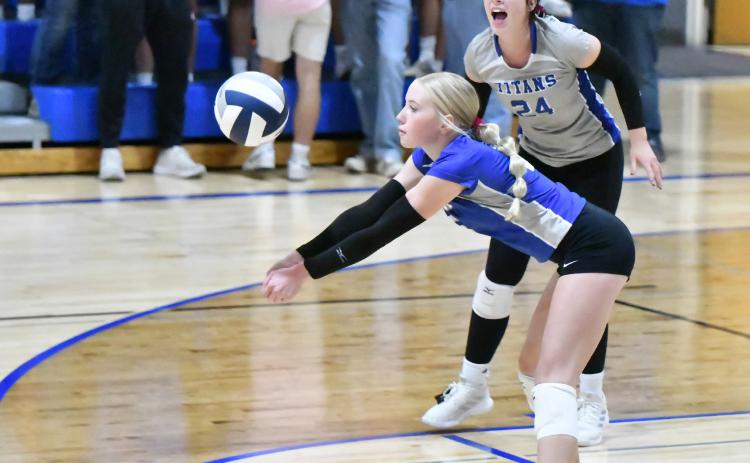 Myah Rinkol makes a play in the back row for Twin River against Dorchester. NCJ photo by Rick Holtz