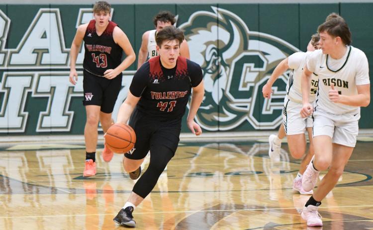 Terrick Gonsior leads the break off a steal for the Warriors. NCJ photo by Rick Holtz Central City 51, Fullerton 47 Fullerton: Wetovick 25, Gochenour 6, F. Dubas 5, N. Dubas 5, Supik 3, Gonsior 3. Central City: Ruhl 23, Lueders 9, Negus 8, Ryan 6, Morner 5.