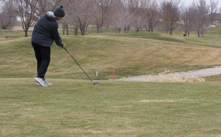 Golf Battles the Weather
