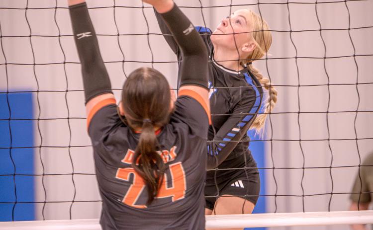 Myah Rinkol finished with 4 kills against Osceola on Thursday. NCJ photo by Rick Holtz