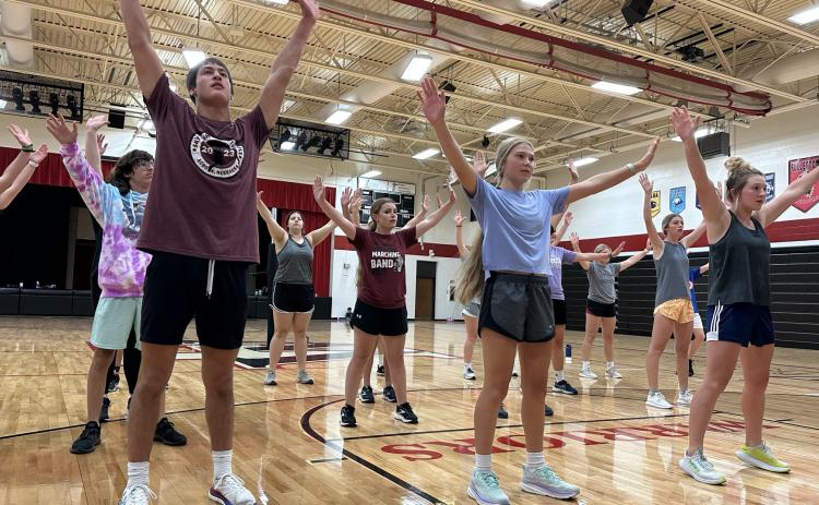 Members of Fullerton’s inaugural show choir, 8th and Broadway, work on their moves last week as part of choreography camp, learning the dances from Emma Sutter, who is a former competitive dancer. NCJ photo by Rick Holtz