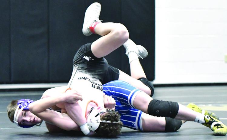 Zach Held pinned Collin Hopkins (North Bend Central) in 37 seconds in their quarter- final match up. NCJ photos by Rick Holtz