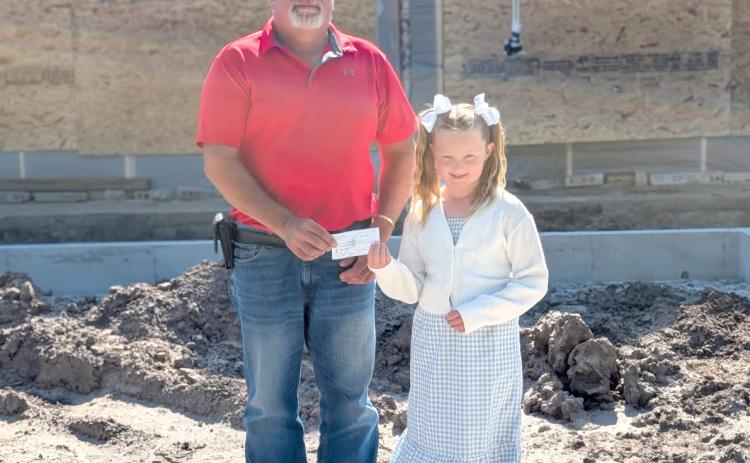 Charlotte Bittner raised $253 from her recent lemonade stand. She donated it to the Mt. Calvary Lutheran Church Building Fund for their new addition. She wanted to say thank you to everyone who came to her lemonade stand! Photo provided by Rachel Bittner
