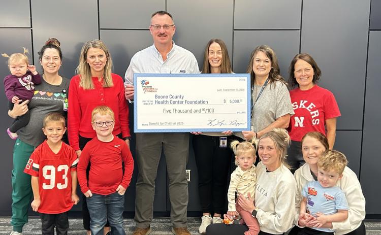 Representatives from Boone County Health Center’s Occupational, Speech, Physical Therapy and Grant/PR departments along with several children who have benefited from Pediatric Therapy accept a $5,000 Valero Benefit for Children grant from Valero representatives Andy Roberts, Plant Manager, and Nicole Levander, Office Coordinator. Photo provided