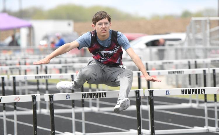 Jaycek Green turned in a season best time of 20.22in the 110-meter hurdles on Friday at the Goldenrod Conference track meet.  NCJ photos by Rick Holtz