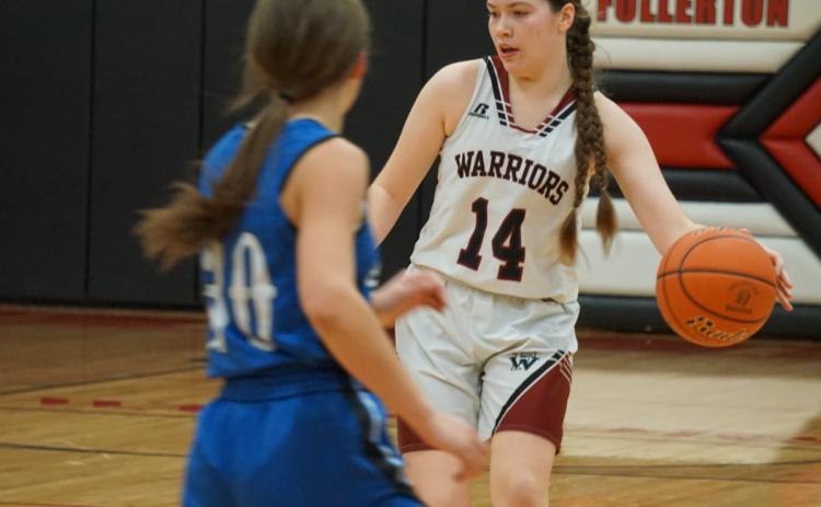 Georgia Bridger works to move the ball against the St. Francis pressure defense on Saturday. NCJ photo by Cathy Cook