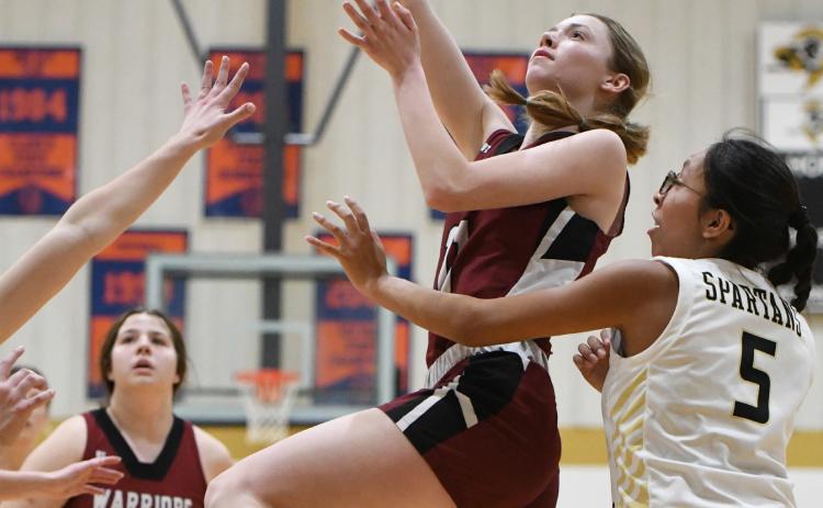 Jaci Maxfield goes up for two of her six points on Thursday in Fullerton’s 34-20 road win over Ansley/Litchfield. NCJ photo by Rick Holtz