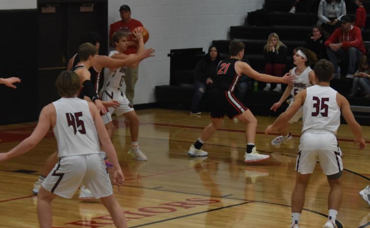 Pictured above: Justin Horn waiting for Jaxson Sullivan to get open for a pass. Picture submitted by Carla Wetovick