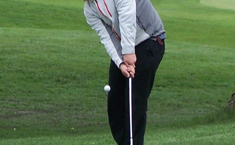 Jerrod Land hits a chip shot onto the second green at Monday’s D-2 District at Twin Creek Golf Course. Photos provided
