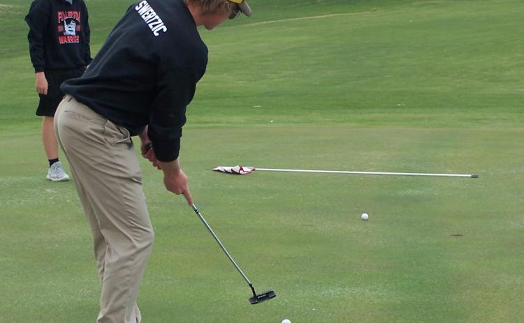 Trey Swertzic looks to sink a putt at Pawnee Hills Golf Course on Monday. Fullerton Schools photos