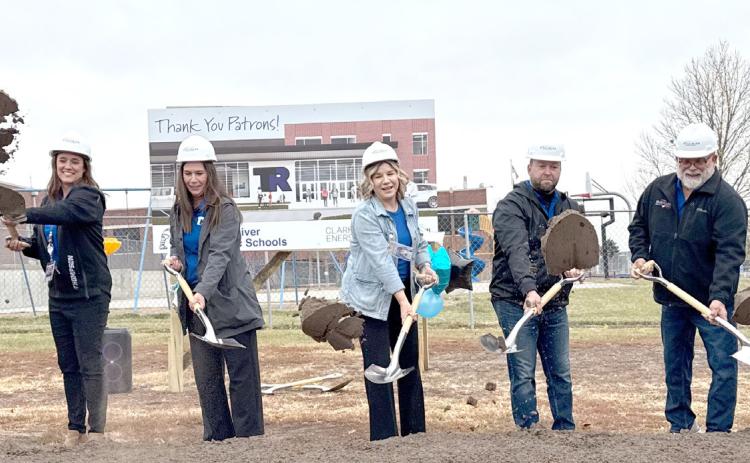 Members of the Twin River Board of Education were joined by administrators to move the first shovels of dirt in the district’s $39.9 million building project. NCJ photo by Rick Holtz