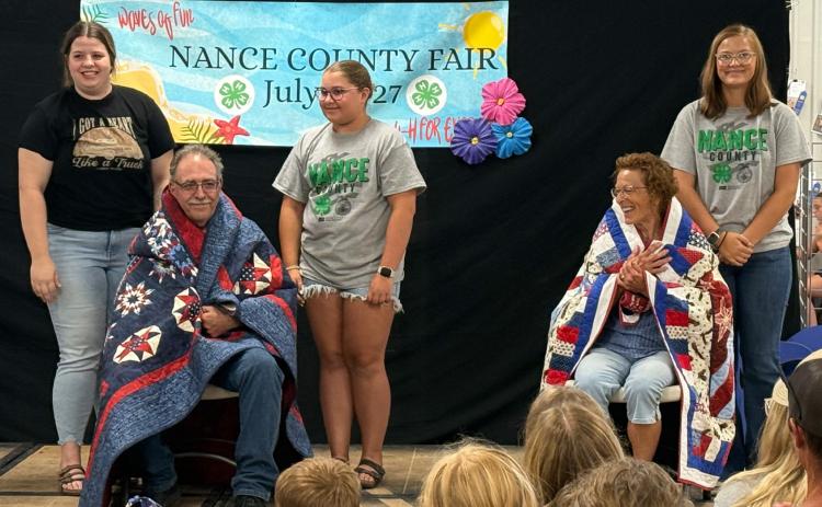 Dennis Gabriel and Susan K. Smith received Quilts of Valor. NCJ photo by Rick Holtz