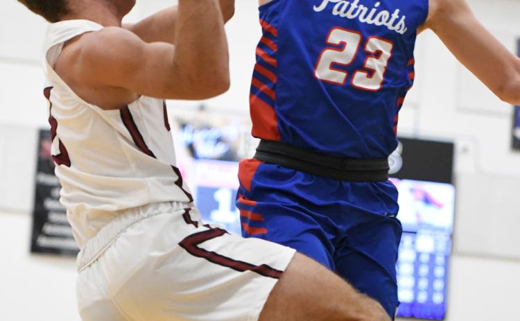 Fletcher Dubas finished with a game-high 14 points in the opening round of the Shelby-Rising City Holiday Tournament against Clarkson/Leigh. NCJ photo by Rick Holtz