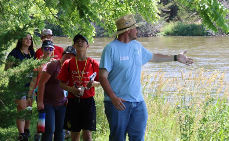 Instructor Brant Bechtold leads campers on a trail hike during the habitat session. Photo provided
