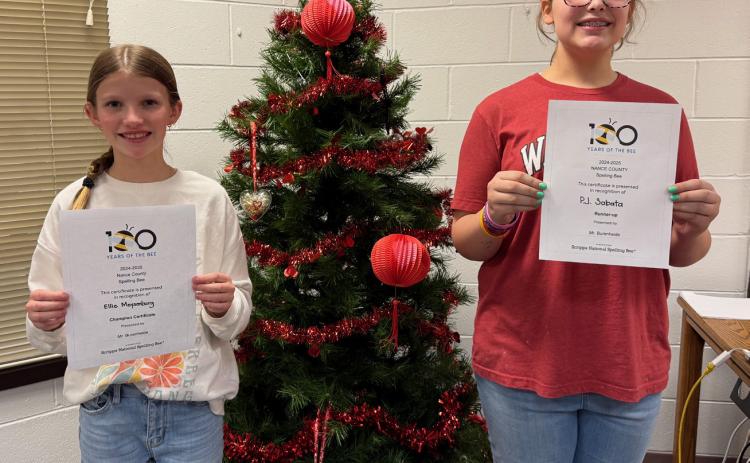 Ellie Meysenburg (left) won the Nance County Spelling Bee on Wednesday at Fullerton High School. P.J. Sabata was the runner-up for the second year in a row. NCJ photo by Rick Holtz