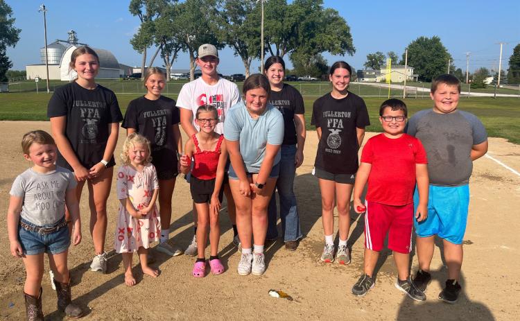 FFA officers pose with some participating children. From left to right: Charlotte Bittner, Ella Pickrel, Everly Schock, Morgan Supik, Maxton Meysenburg, Ellie Meysenburg, Harper Pickerl, Melinda Pickrel, Josie Williams, Hudson Carr and Brady Carr. NCJ photo by April Carr